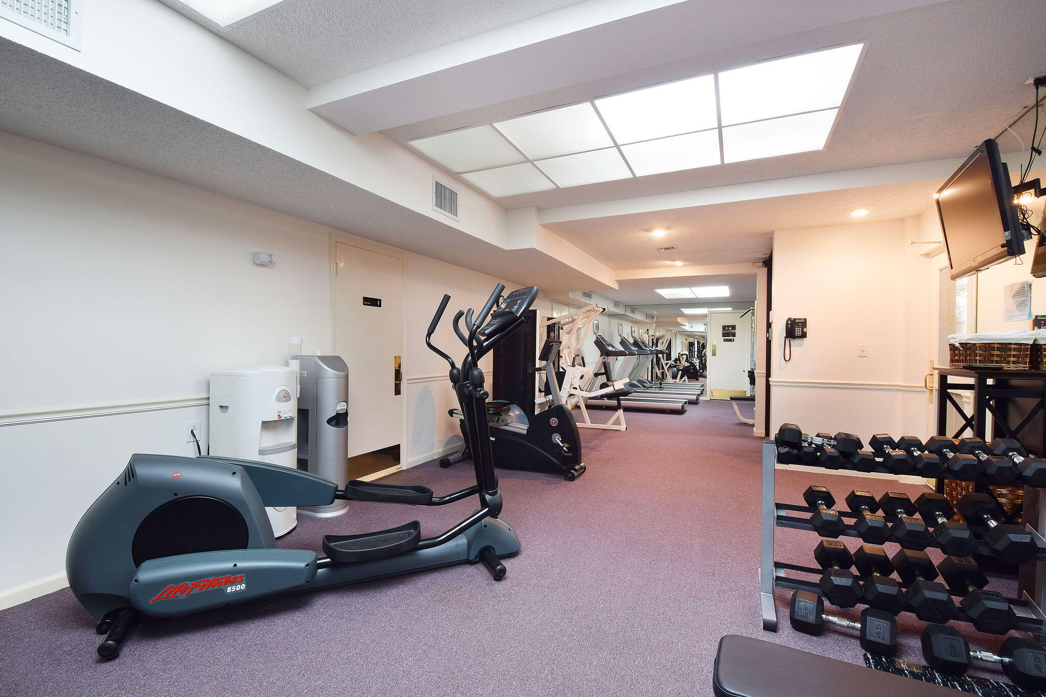 3440 South Ocean Boulevard, Unit 105S Palm Beach, FL 33480 - Photo 47 of 77 a room with gym equipment