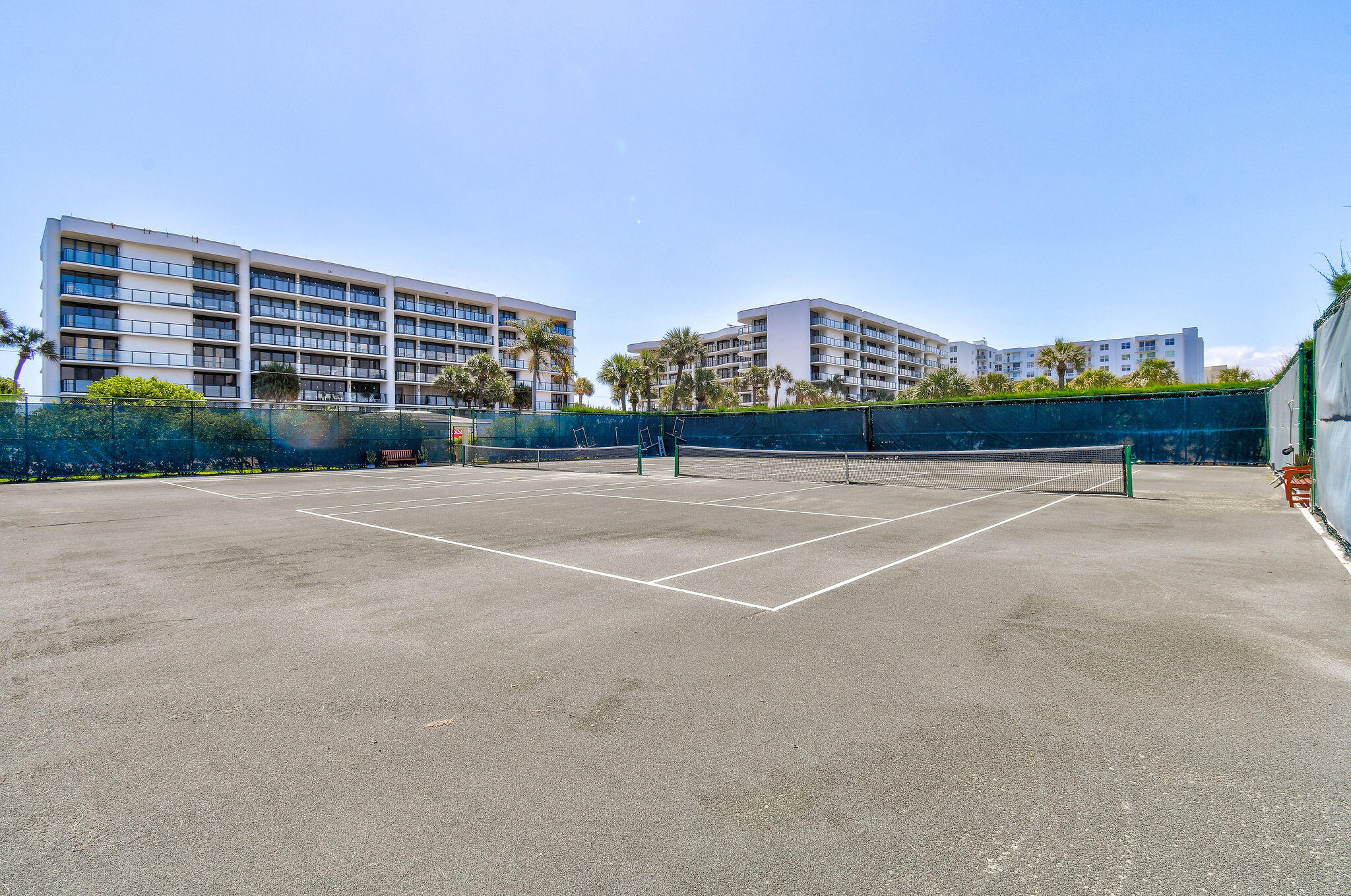3440 South Ocean Boulevard, Unit 105S Palm Beach, FL 33480 - Photo 64 of 77 a view of a tennis court