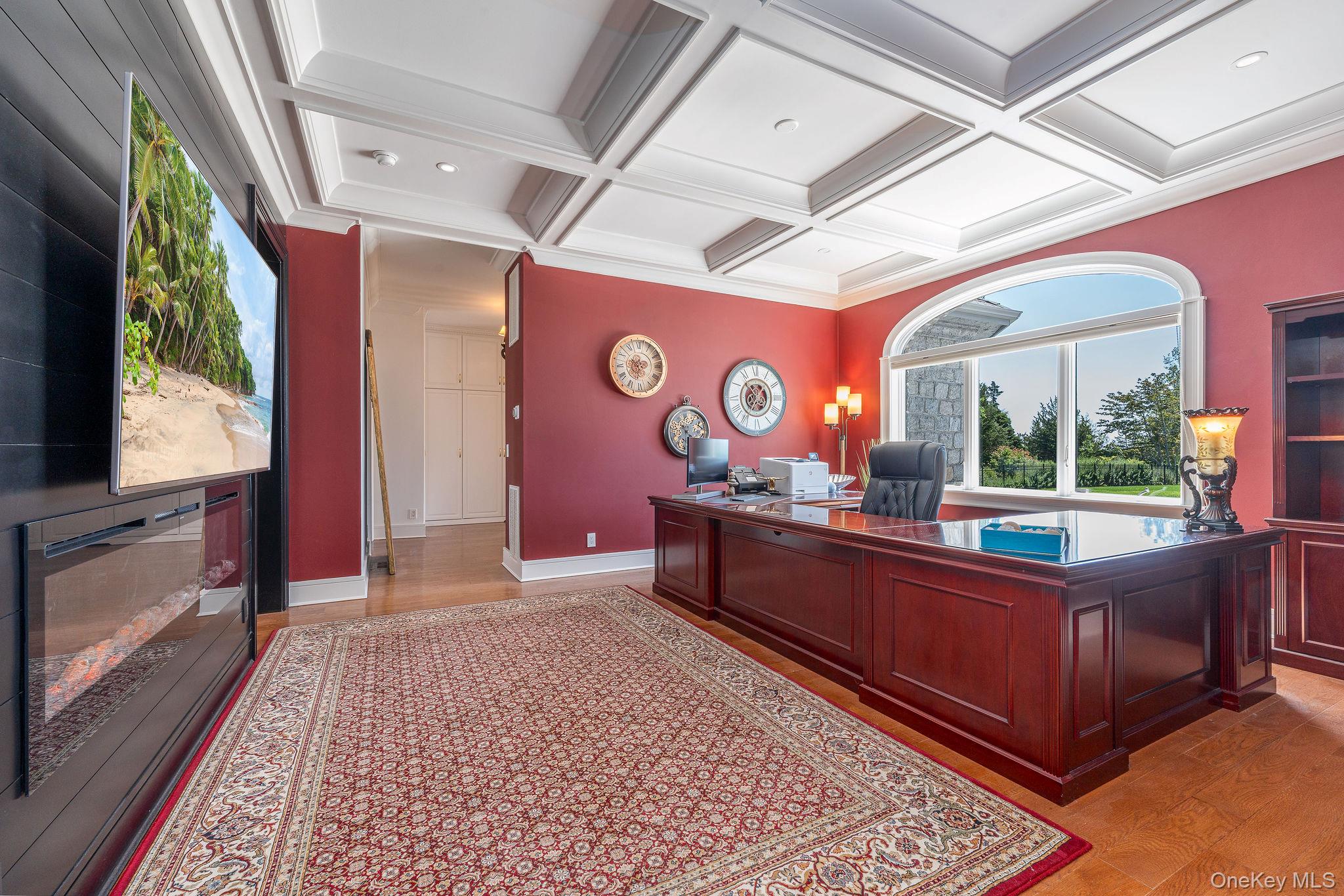 3875 Hallock Lane Mattituck, NY 11952 - Photo 18 of 50 Office featuring light wood-style flooring, beamed ceiling, coffered ceiling, and crown molding