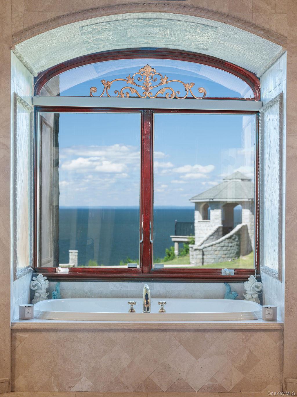 3875 Hallock Lane Mattituck, NY 11952 - Photo 22 of 50 Bathroom with a garden tub and a water view