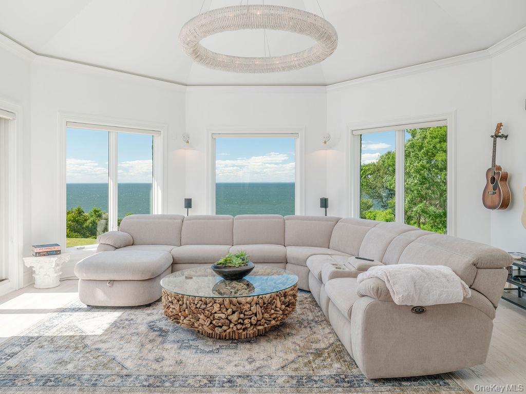 3875 Hallock Lane Mattituck, NY 11952 - Photo 23 of 50 Living area featuring crown molding and wood finished floors