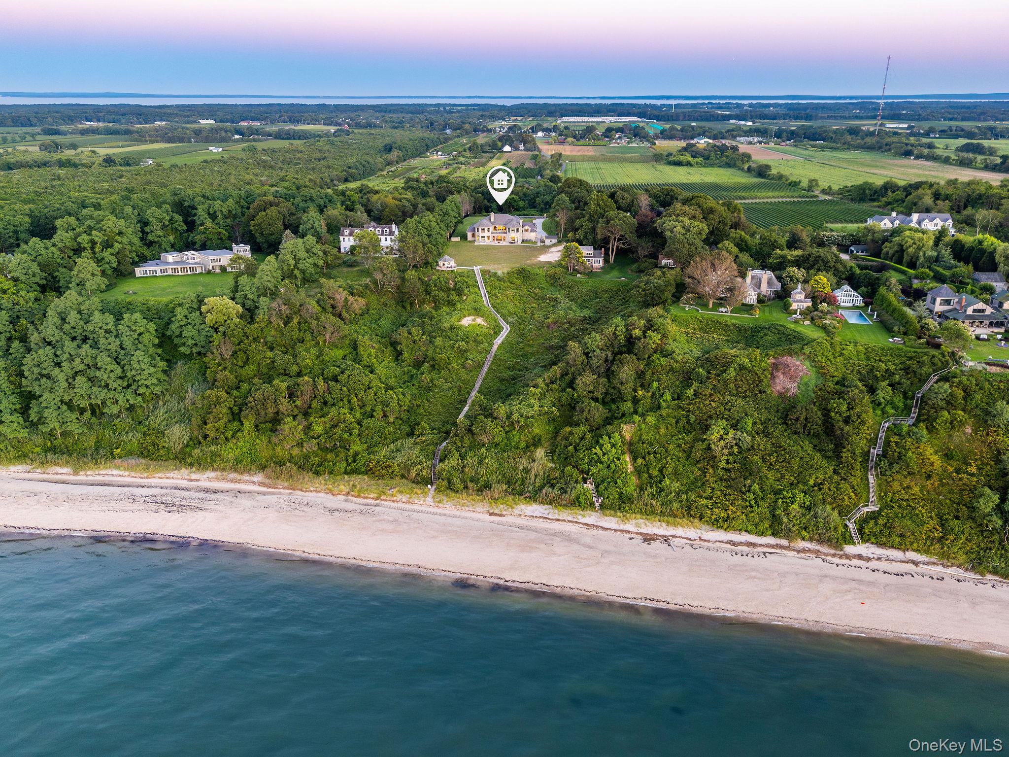 3875 Hallock Lane Mattituck, NY 11952 - Photo 6 of 50 Aerial view at dusk of view of water and beach