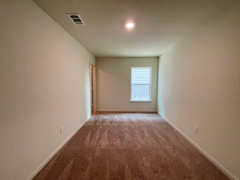 168 Allington Circle Jarrell, TX 76537 - Photo 22 of 40 an empty room with windows