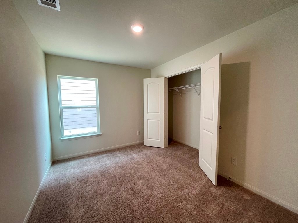 168 Allington Circle Jarrell, TX 76537 - Photo 23 of 40 a view of an empty room with a window