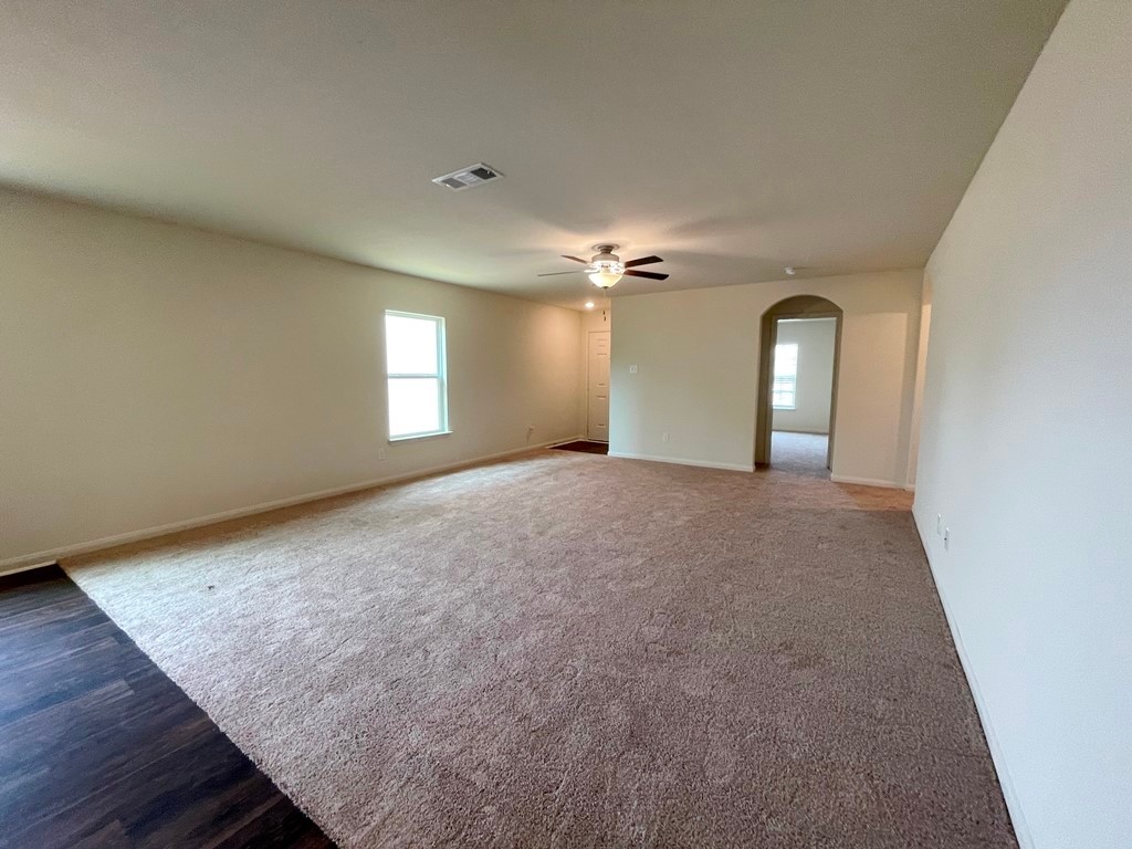 168 Allington Circle Jarrell, TX 76537 - Photo 6 of 40 a view of a livingroom with a staircase