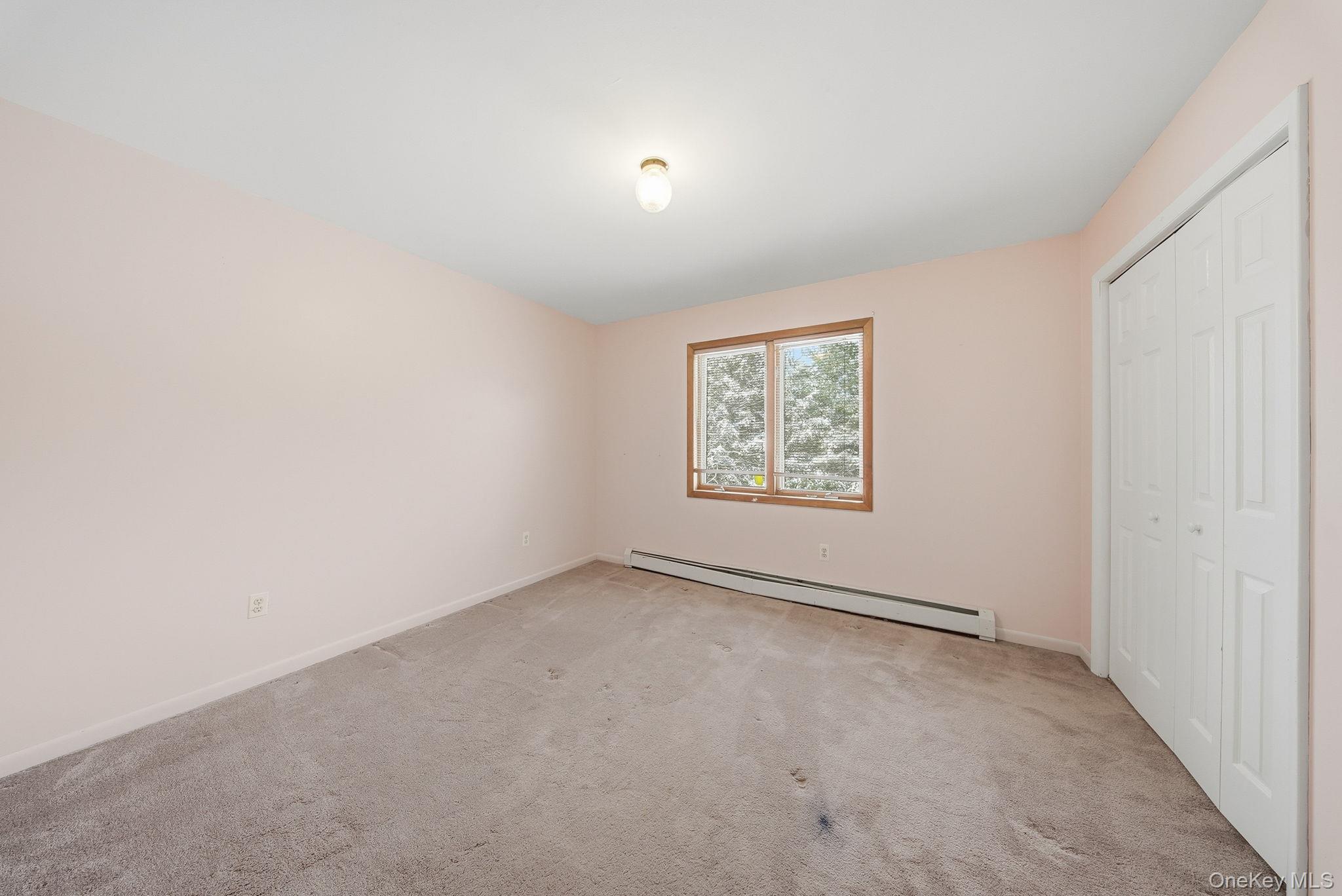 139 Renner Road Mountain Dale, NY 12763 - Photo 26 of 50 an empty room with a window