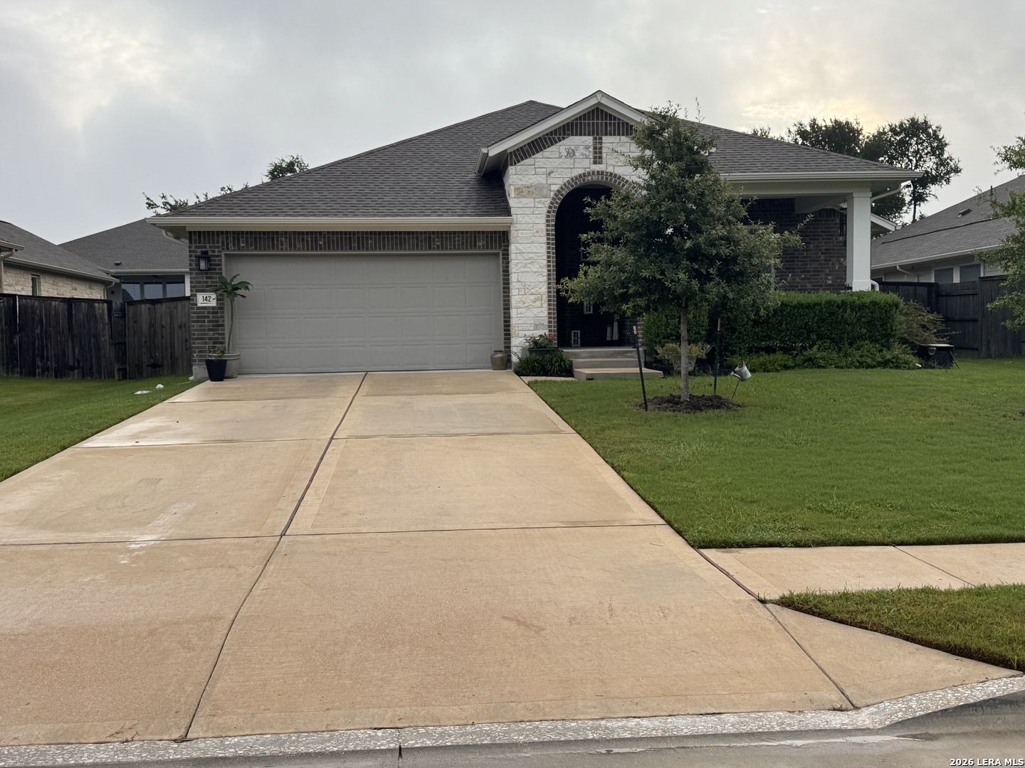 142 Willamette Way Kyle, TX 78640 - Photo 3 of 29 a front view of house with yard