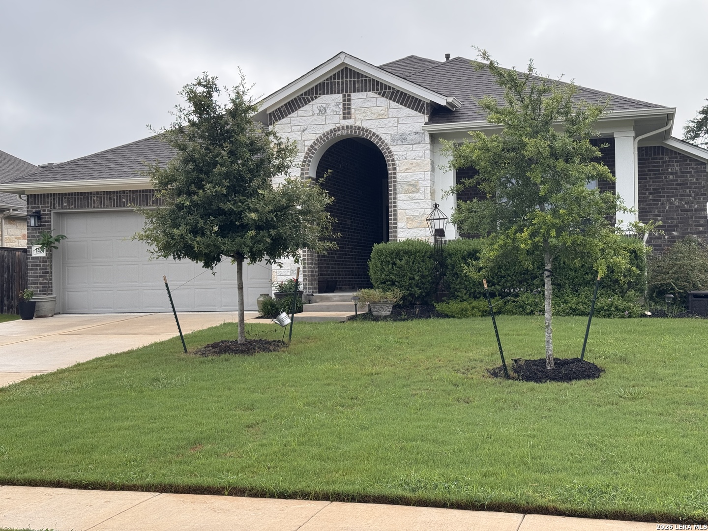 142 Willamette Way Kyle, TX 78640 - Photo 4 of 29 a view of a house with a backyard