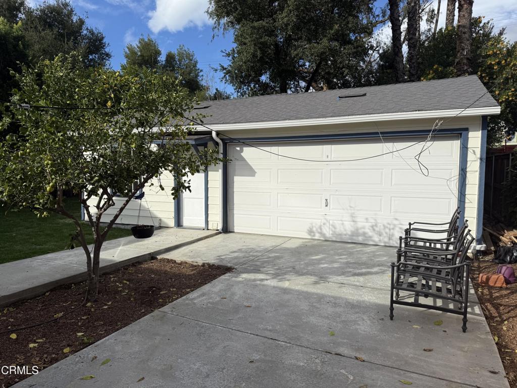 1445 East Woodbury Road, Unit REAR Pasadena, CA 91104 - Photo 4 of 17 a view of backyard and trees