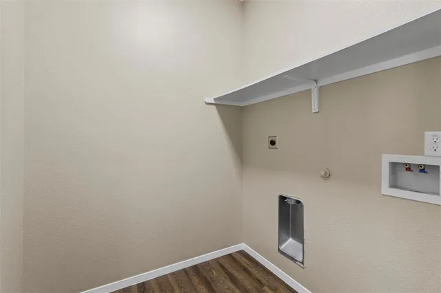 a view of small space with empty racks on the wall