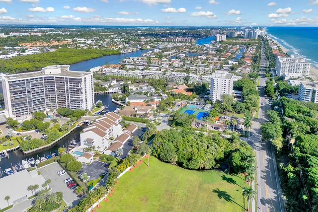 a outdoor space with lots of tables a garden view and chairs