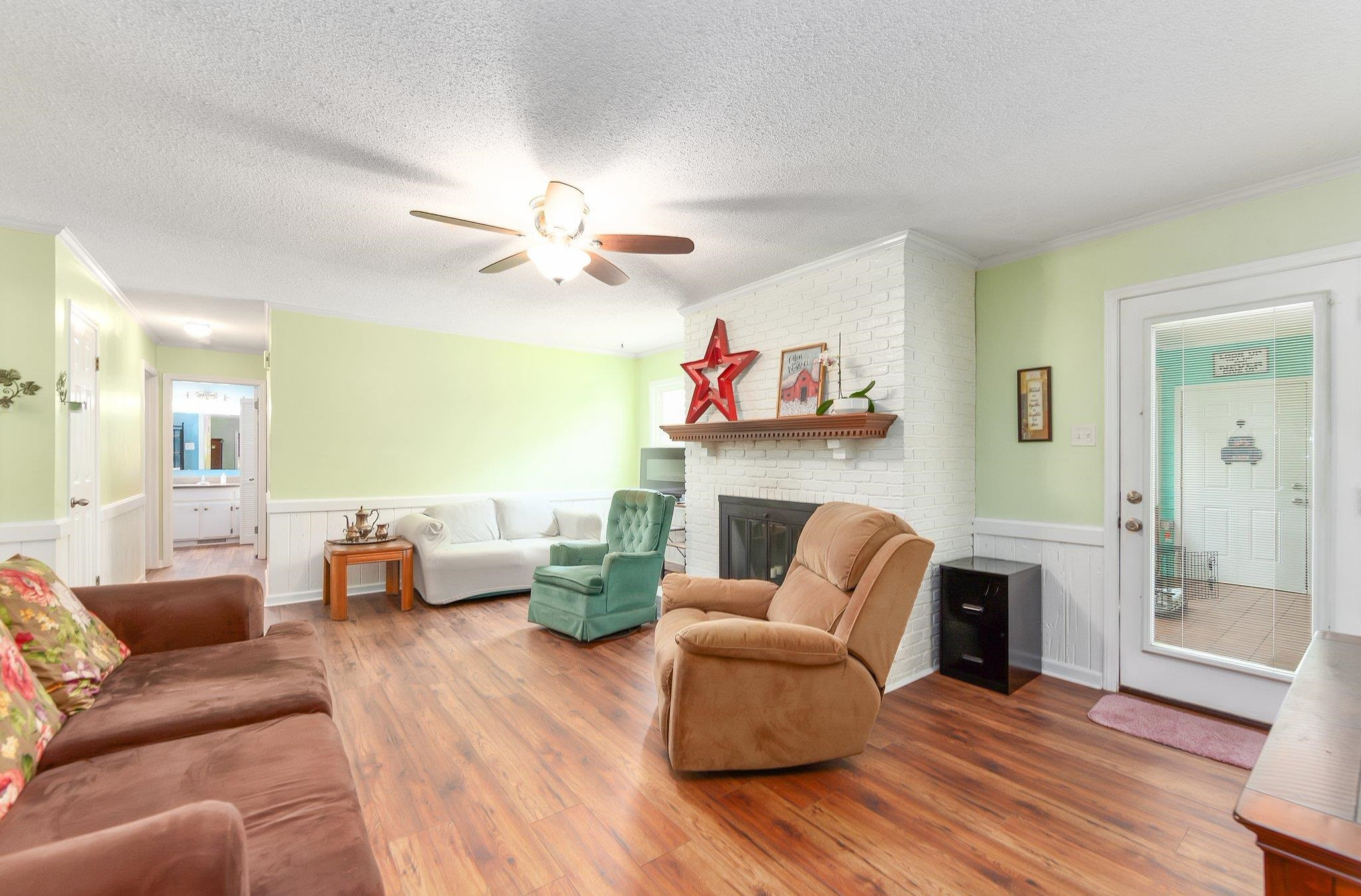56 Ridgeoak Place Jackson, TN 38305 - Photo 11 of 34 a living room with furniture and a fireplace