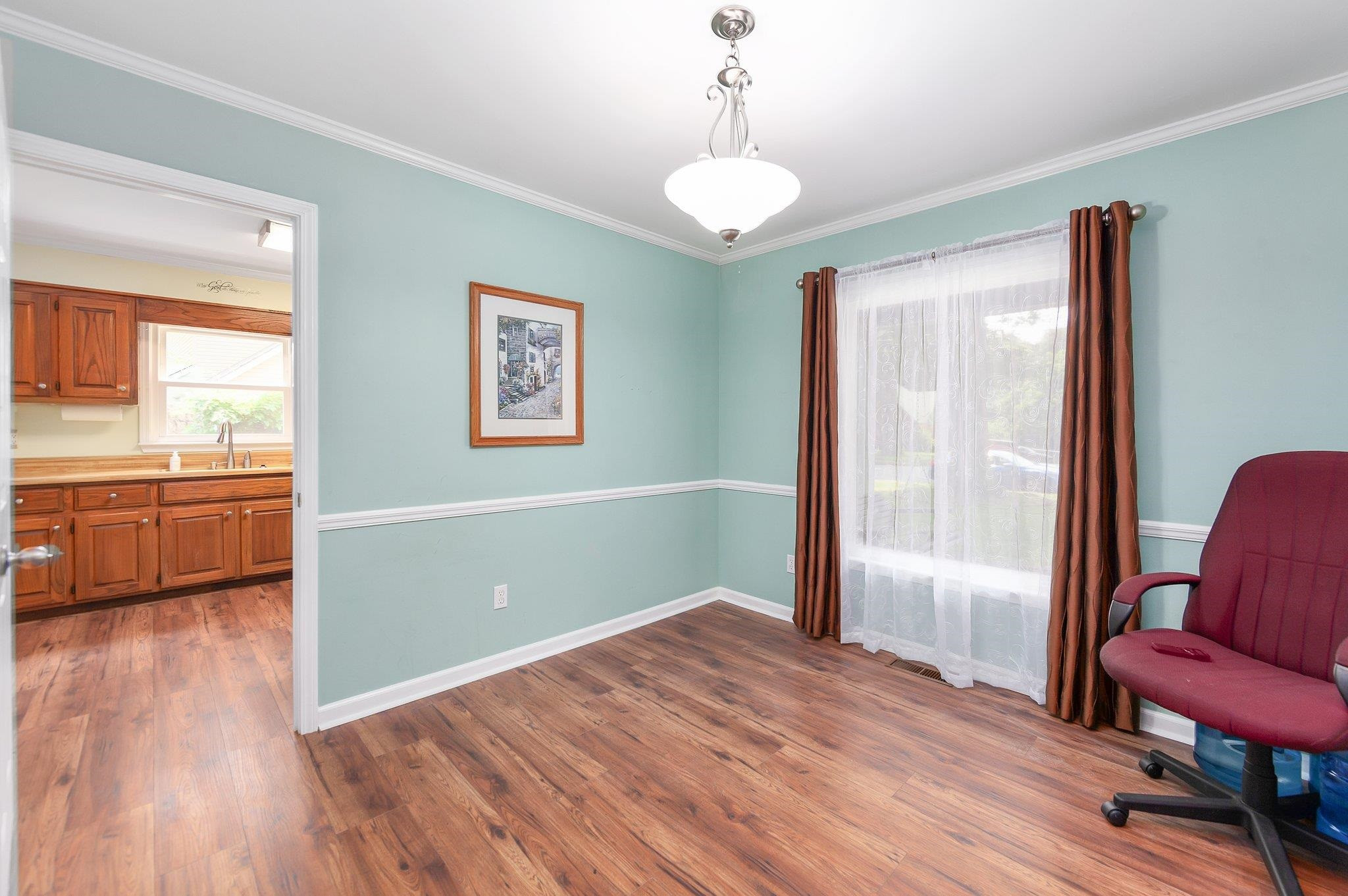 56 Ridgeoak Place Jackson, TN 38305 - Photo 12 of 34 a view of a room with window and wooden floor