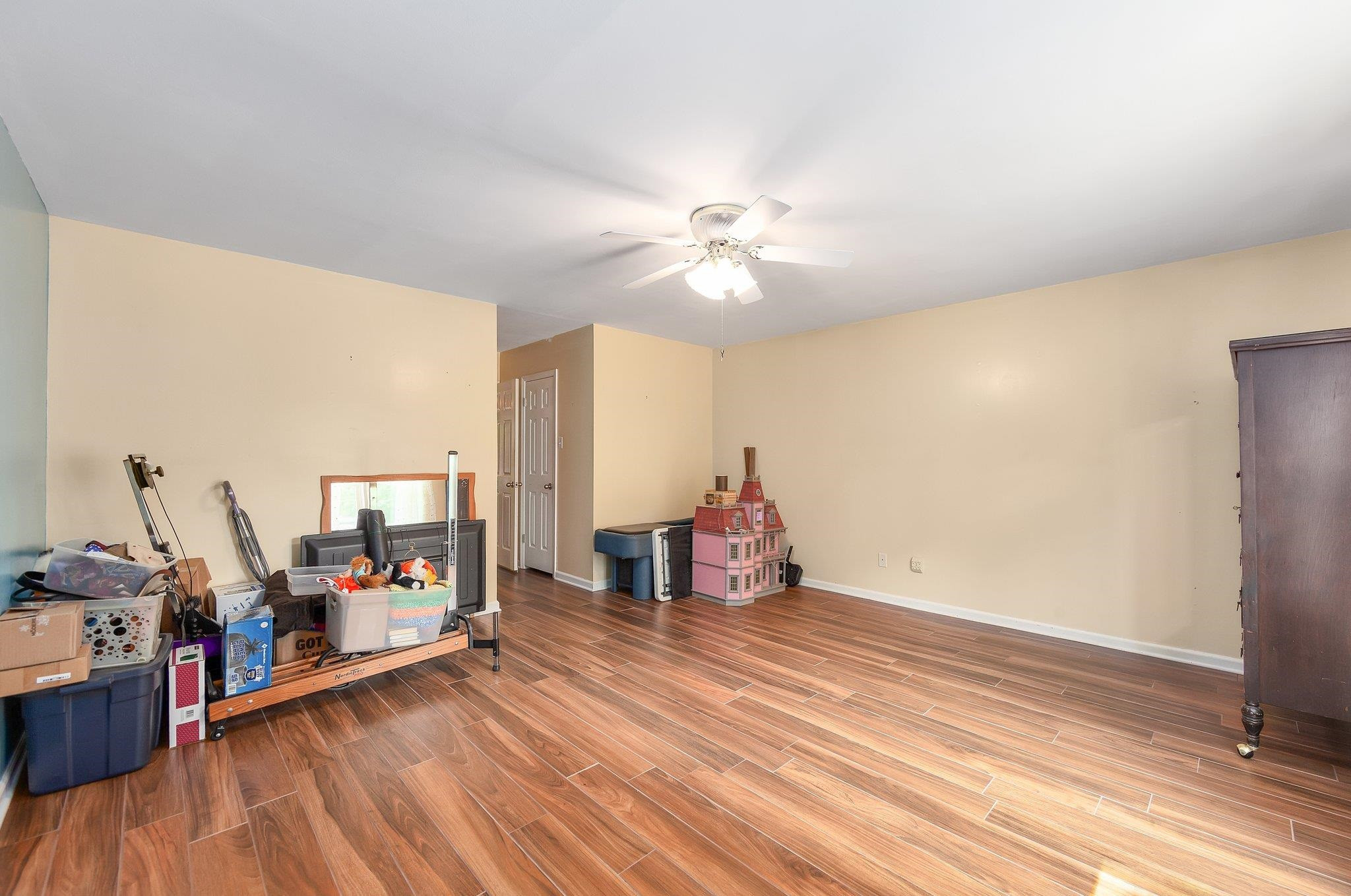 56 Ridgeoak Place Jackson, TN 38305 - Photo 14 of 34 a view of a room with wooden floor