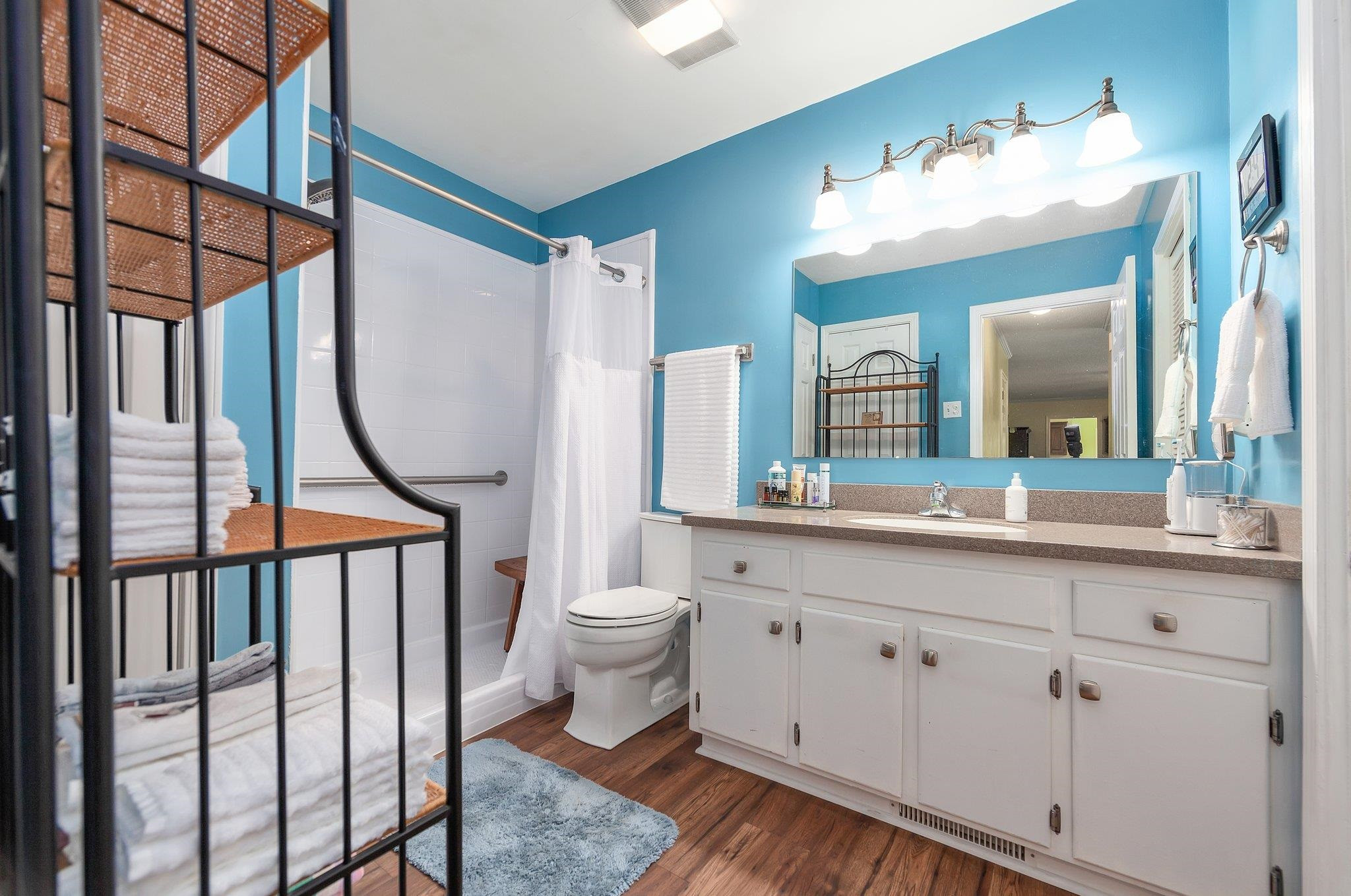56 Ridgeoak Place Jackson, TN 38305 - Photo 16 of 34 a bathroom with a toilet a sink and a mirror