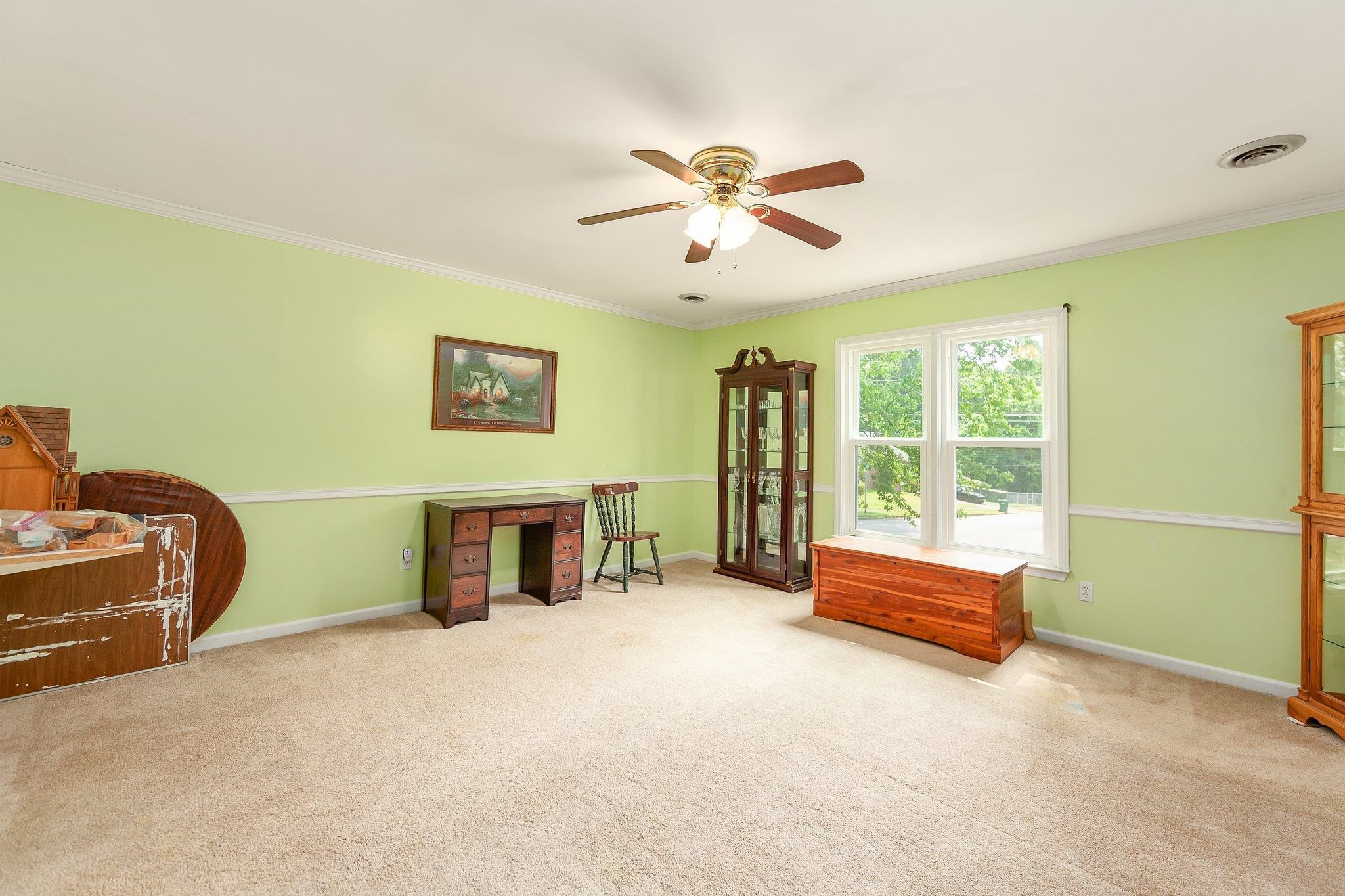 56 Ridgeoak Place Jackson, TN 38305 - Photo 17 of 34 a living room with furniture and a flat screen tv