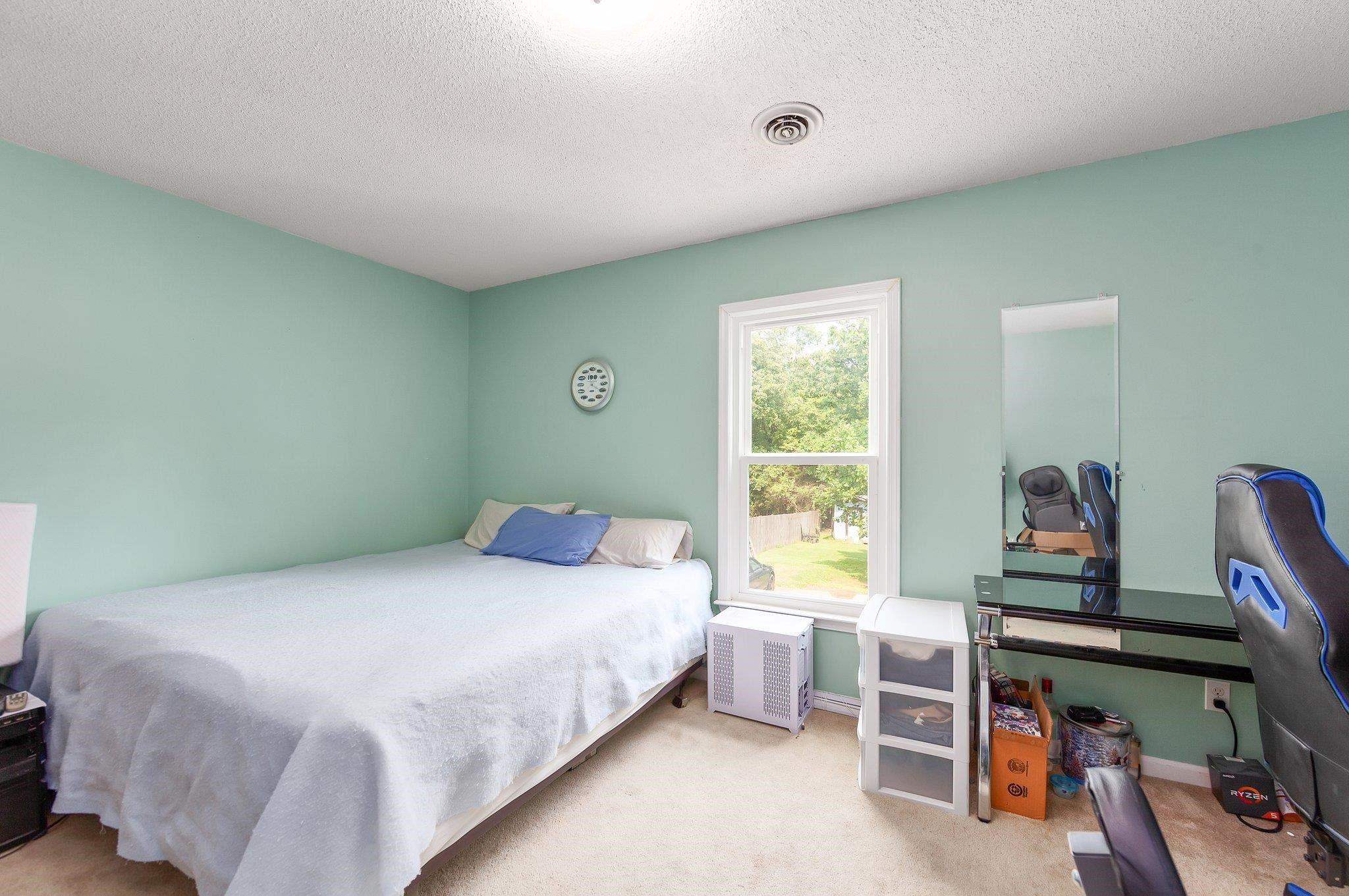 56 Ridgeoak Place Jackson, TN 38305 - Photo 19 of 34 a bedroom with a bed and a desk