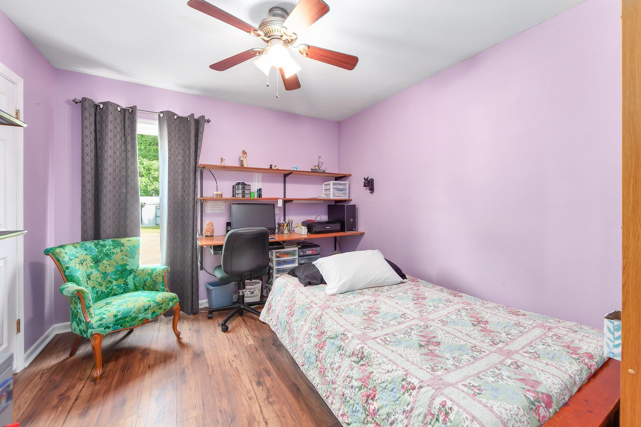 56 Ridgeoak Place Jackson, TN 38305 - Photo 20 of 34 a bedroom with a bed and furniture