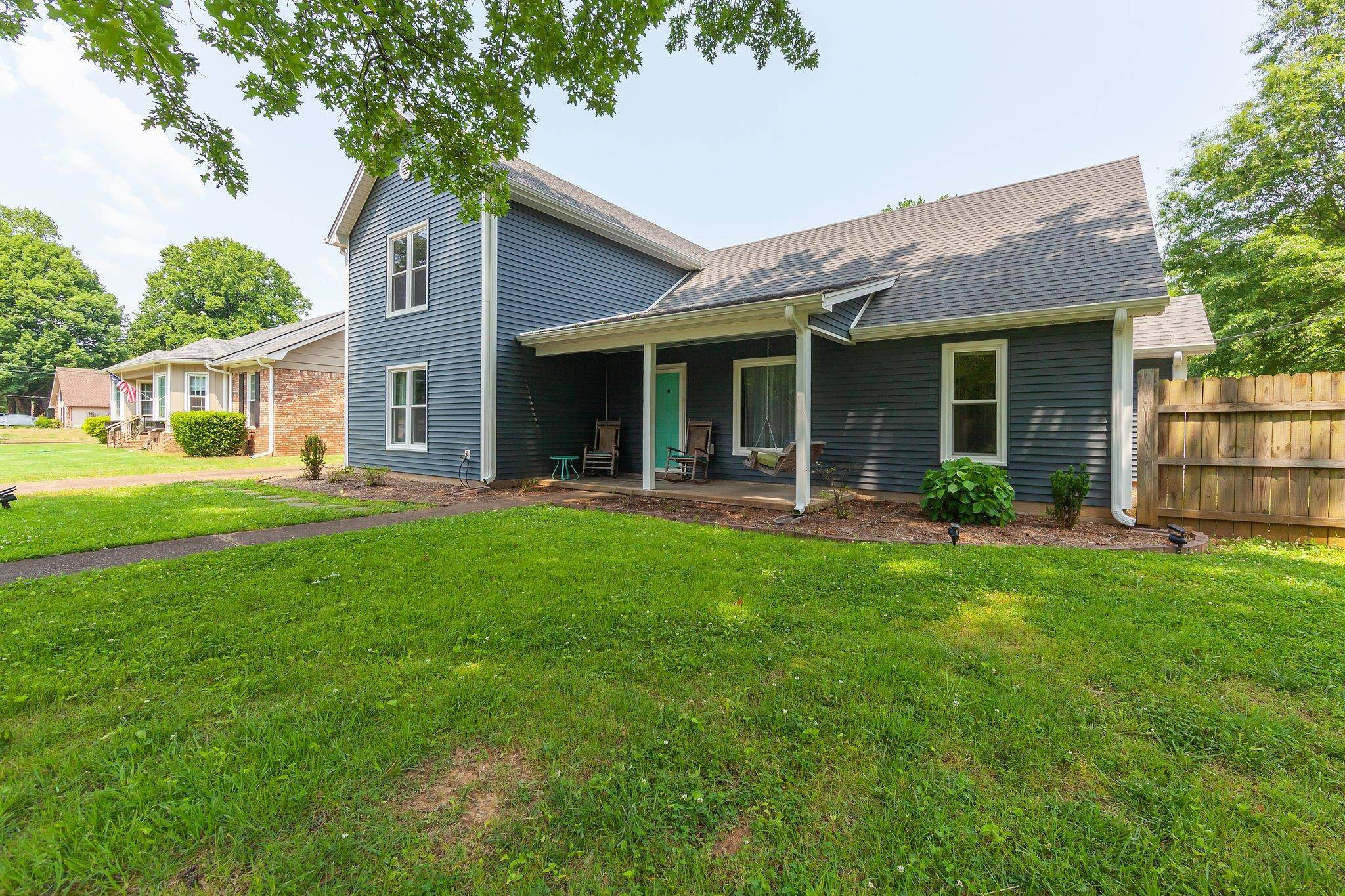 56 Ridgeoak Place Jackson, TN 38305 - Photo 2 of 34 a front view of house with yard and green space