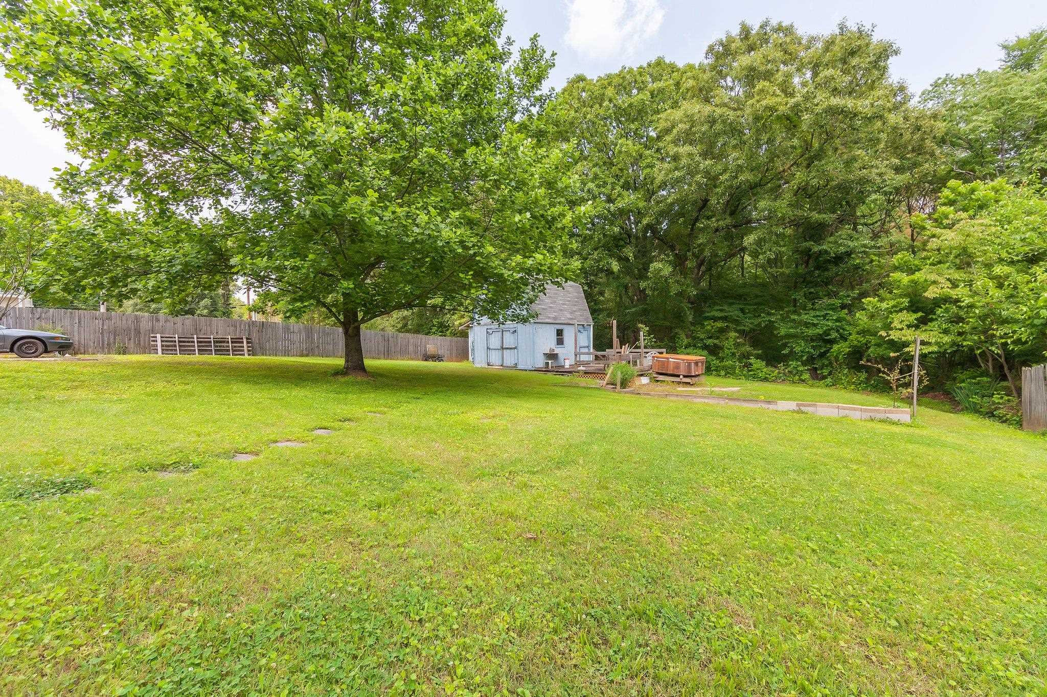 56 Ridgeoak Place Jackson, TN 38305 - Photo 27 of 34 a view of a house with a yard