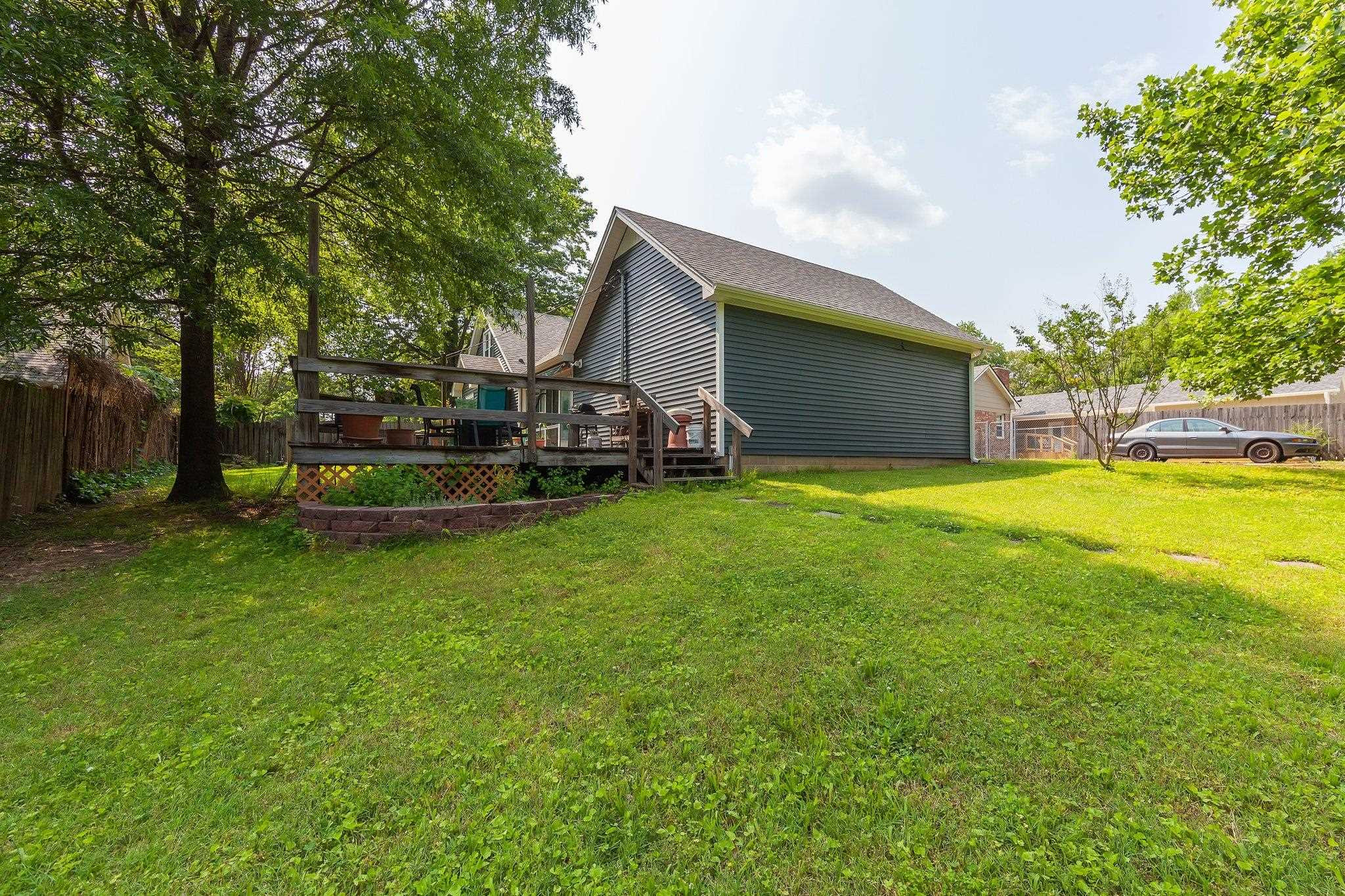 56 Ridgeoak Place Jackson, TN 38305 - Photo 28 of 34 a view of a house with a yard and sitting area