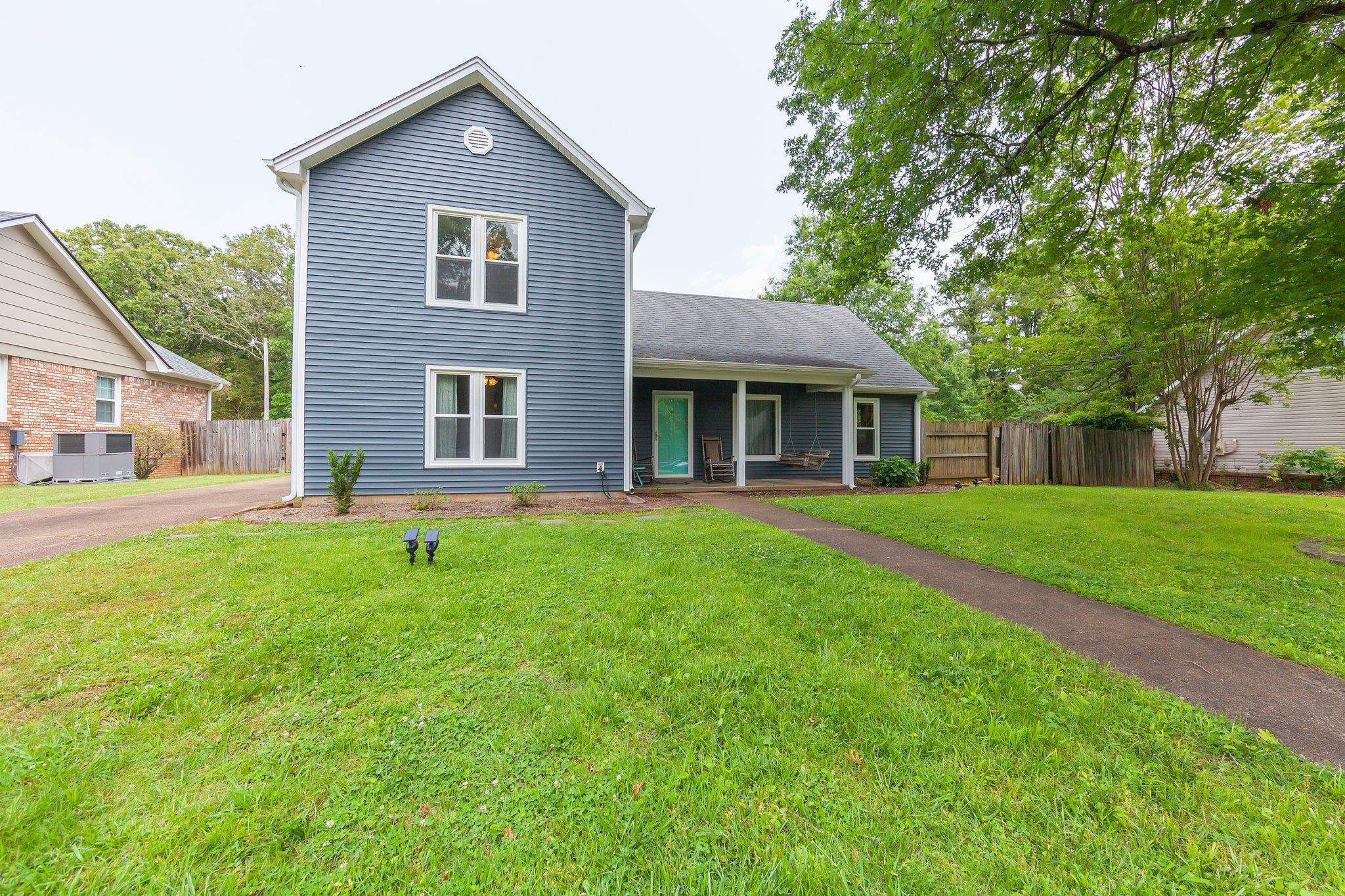 56 Ridgeoak Place Jackson, TN 38305 - Photo 3 of 34 a front view of house with yard and green space