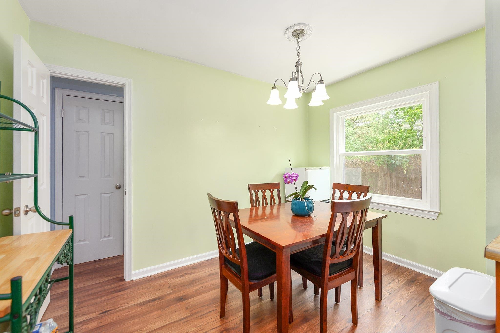 56 Ridgeoak Place Jackson, TN 38305 - Photo 8 of 34 a view of a dining room with furniture window and wooden floor