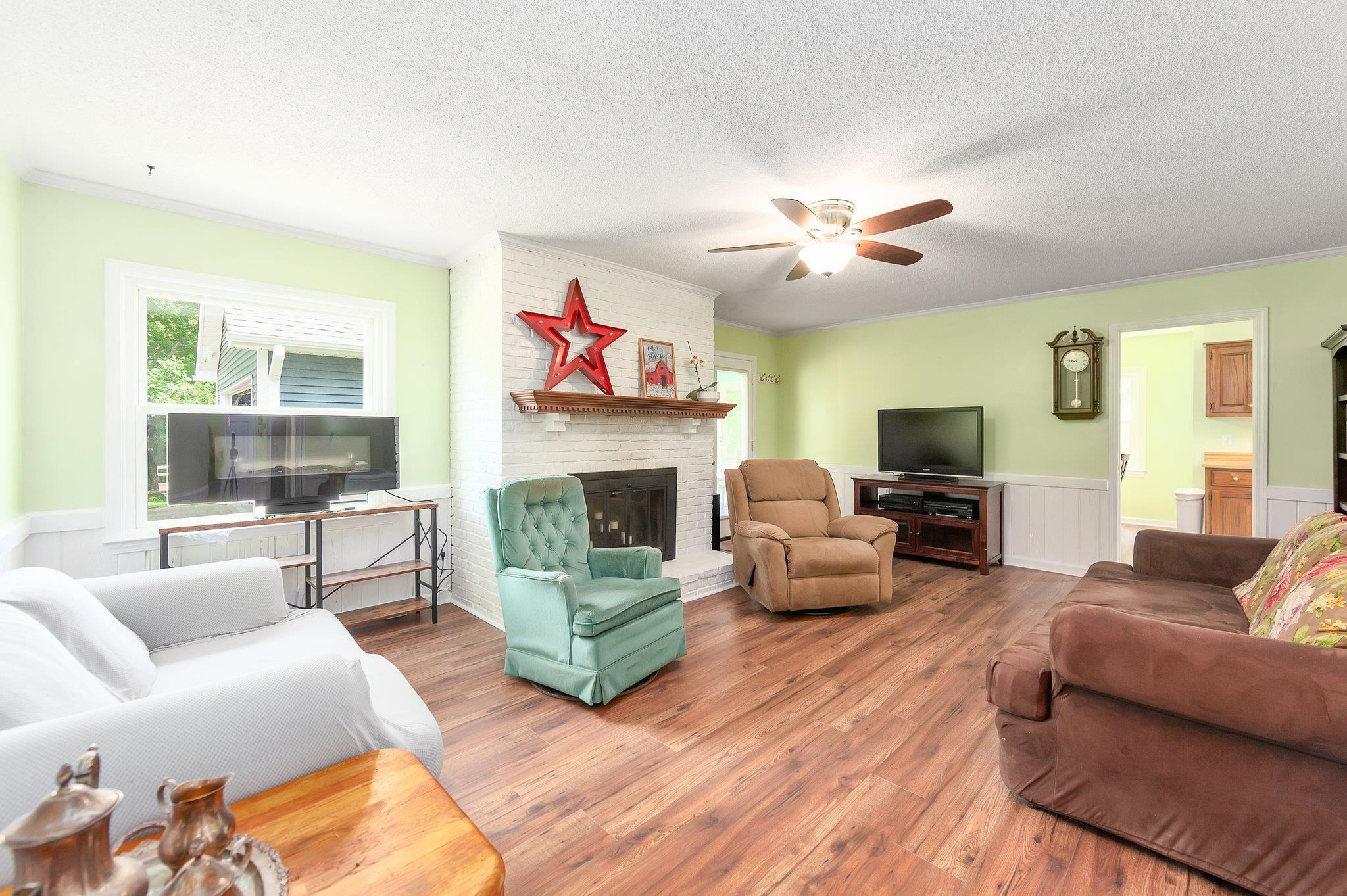 56 Ridgeoak Place Jackson, TN 38305 - Photo 9 of 34 a living room with furniture fireplace and a couch