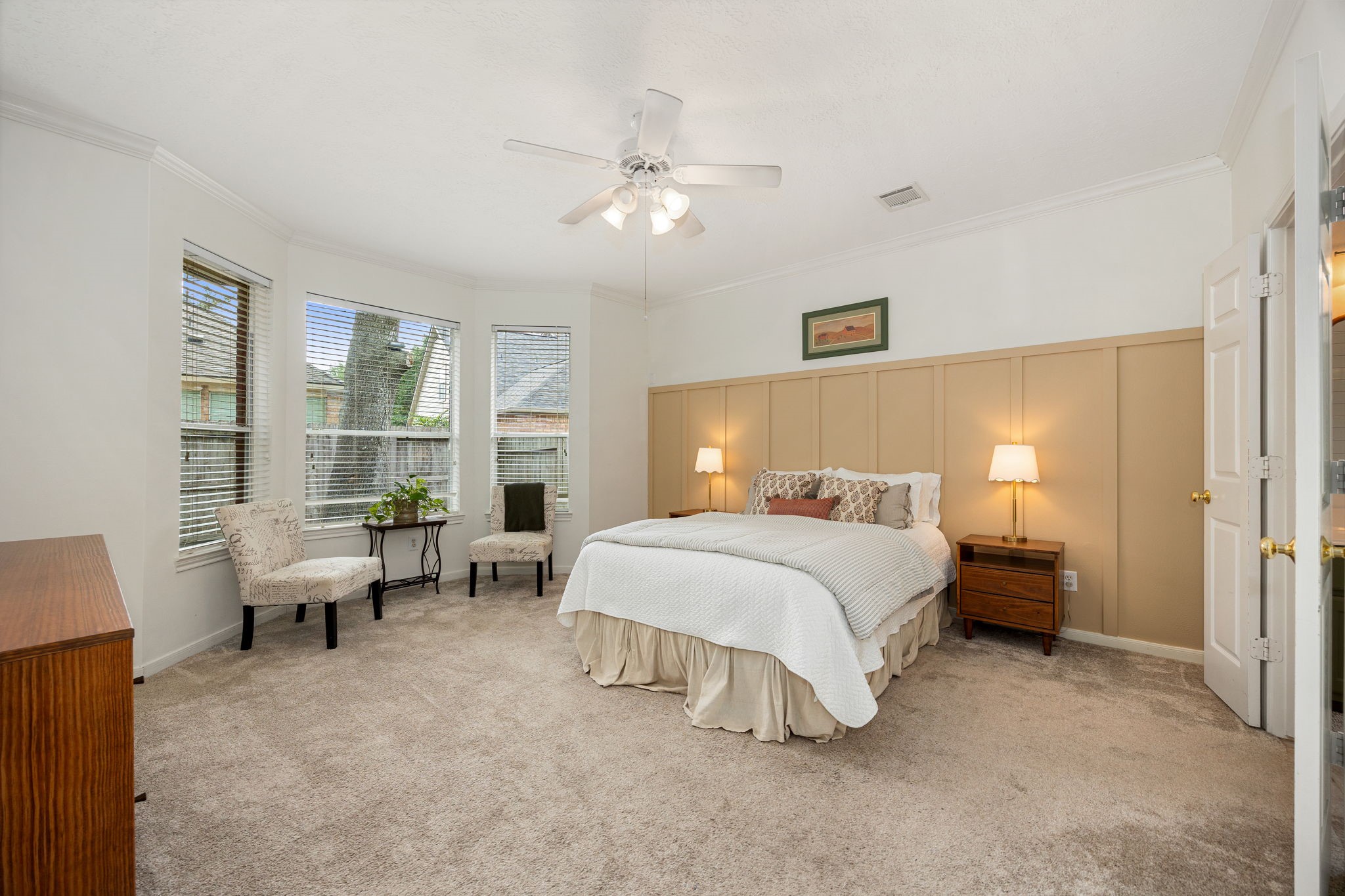 25535 China Springs Spring, TX 77373 - Photo 10 of 36 Primary bedroom retreat full of natural light and additional seating area for reading and spending quiet time alone