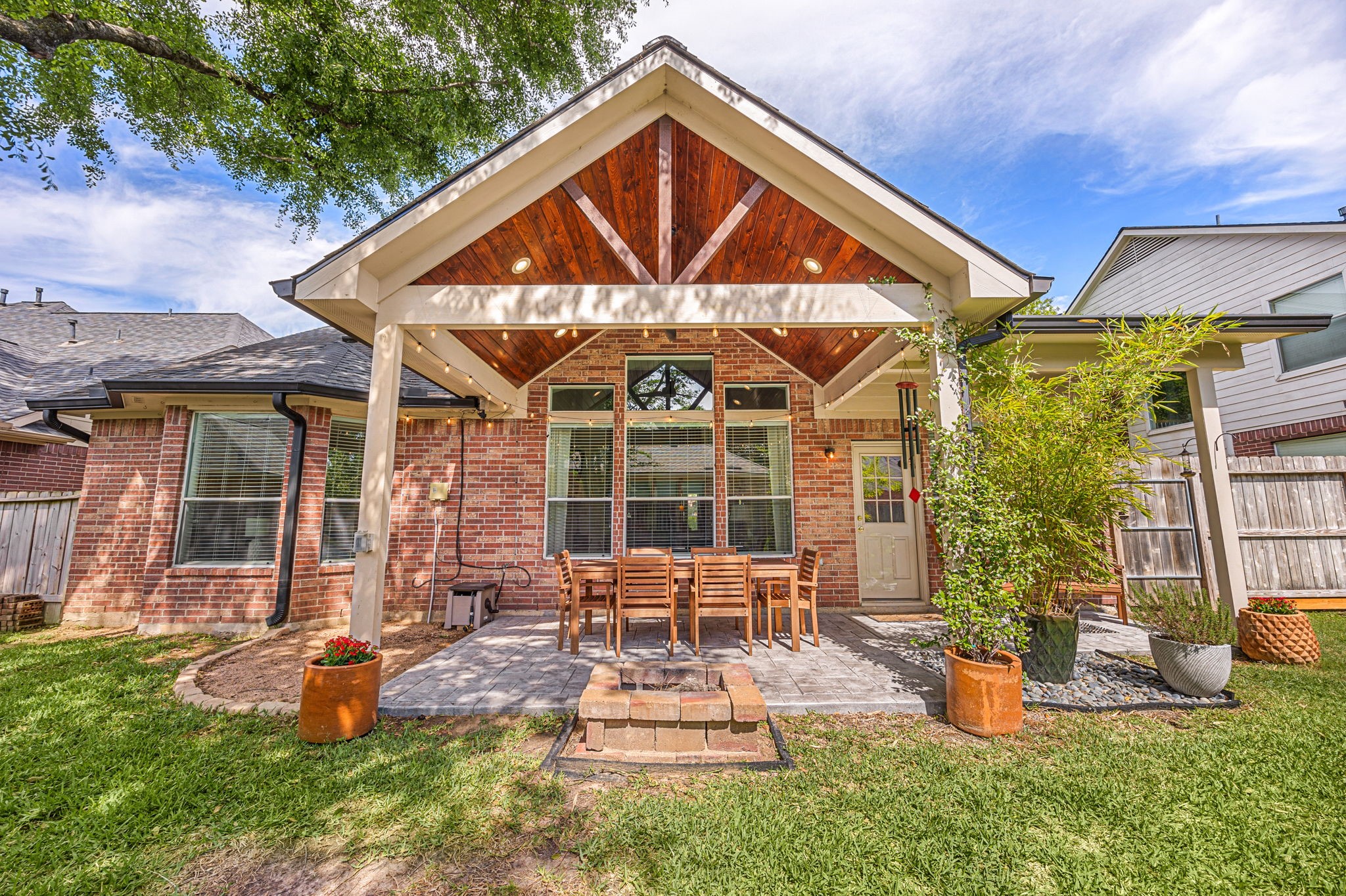25535 China Springs Spring, TX 77373 - Photo 27 of 36 Stunning custom covered porch with oak ceiling treatment and cedar beams