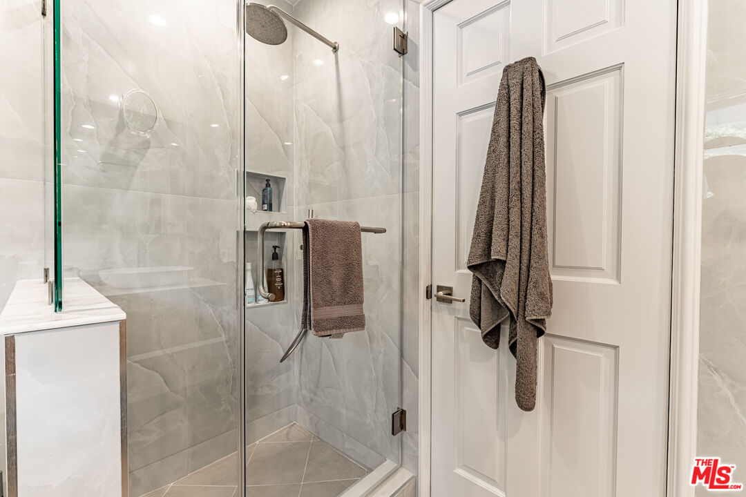 1438 San Ysidro Drive Beverly Hills, CA 90210 - Photo 31 of 40 a bathroom with a shower