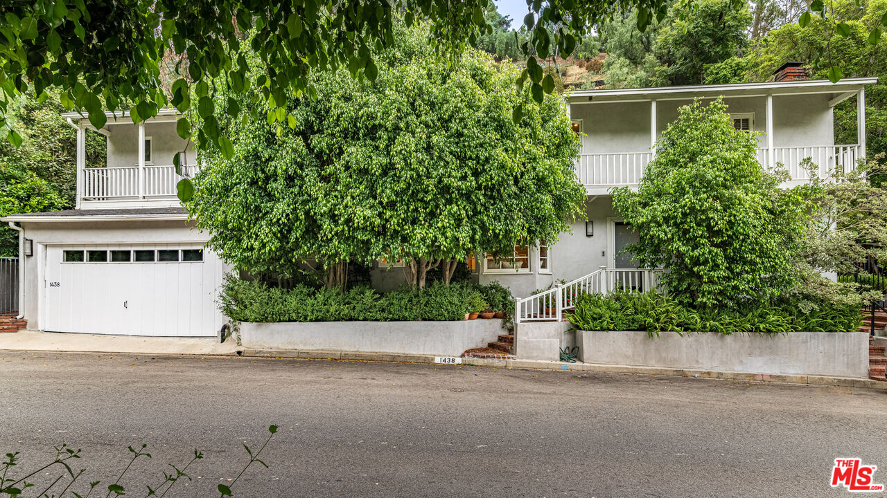 1438 San Ysidro Drive Beverly Hills, CA 90210 - Photo 39 of 40 front view of house with a street