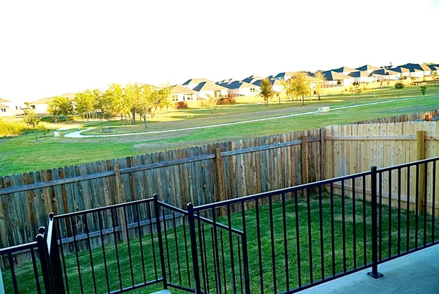 a view of a balcony with an ocean view