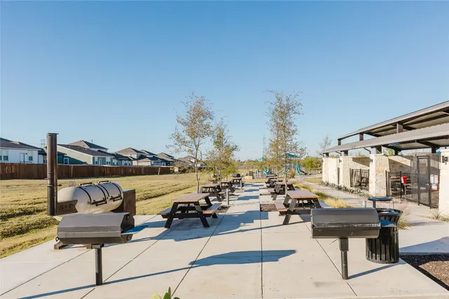 a view of a terrace with seating area