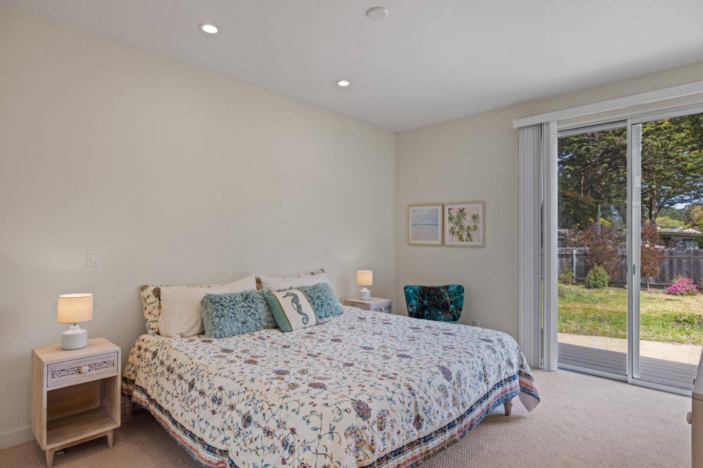 3339 Taylor Road Carmel, CA 93923 - Photo 14 of 27 a bedroom with a bed and a lamp