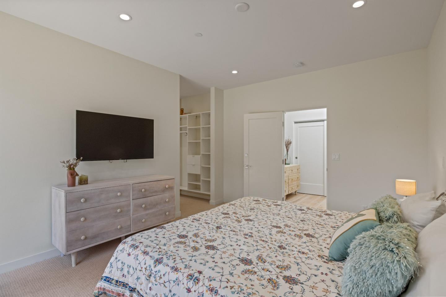 3339 Taylor Road Carmel, CA 93923 - Photo 15 of 27 a bedroom with a bed and a flat screen tv in it