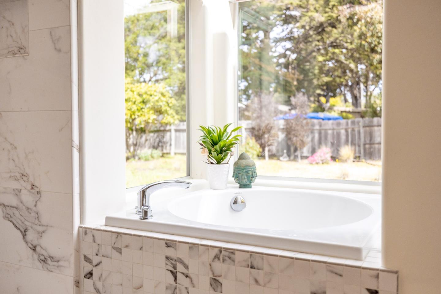3339 Taylor Road Carmel, CA 93923 - Photo 18 of 27 a close up of a sink a mirror and a shower