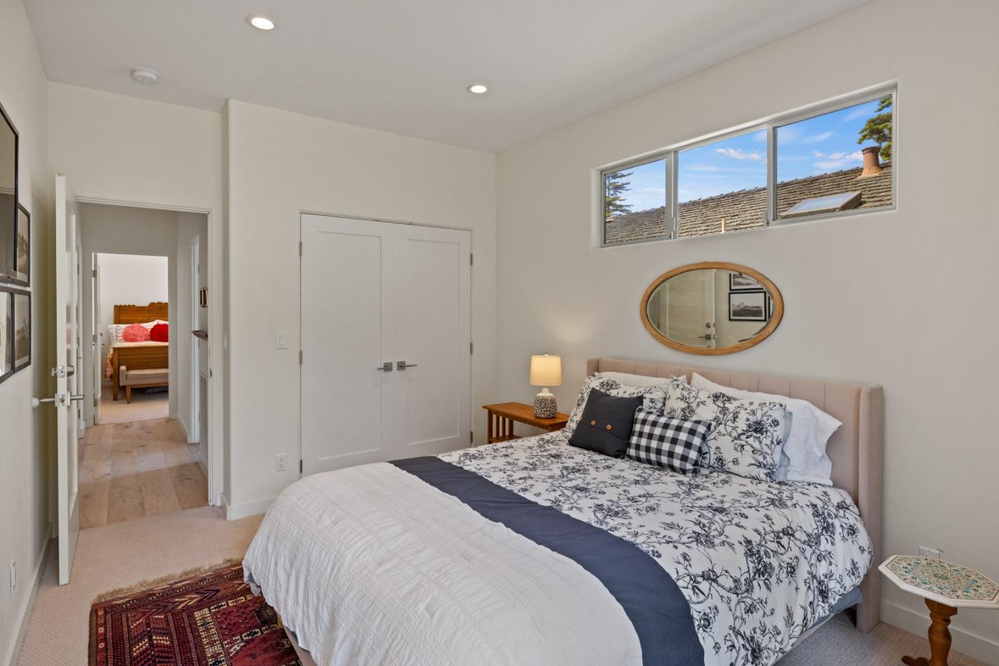 3339 Taylor Road Carmel, CA 93923 - Photo 20 of 27 a bedroom with a bed and a lamp on dresser