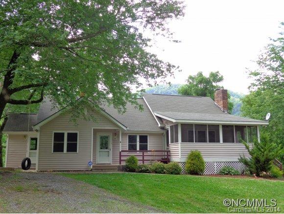 80 Merida Gap Road Canton, NC 28716 - Photo 1 of 18 a front view of a house with a yard and trees