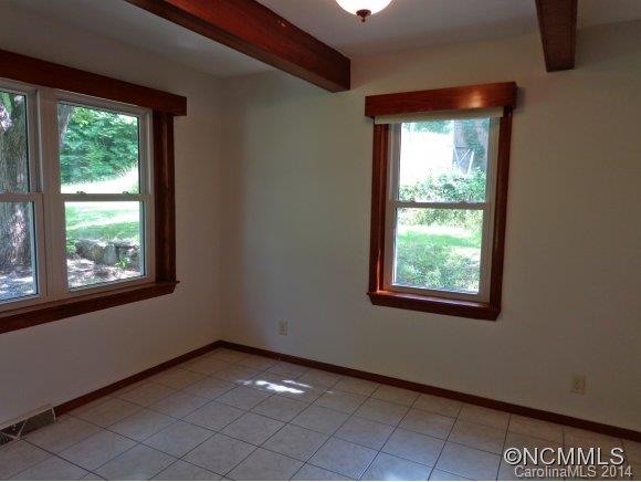 80 Merida Gap Road Canton, NC 28716 - Photo 12 of 18 a view of an empty room with a window