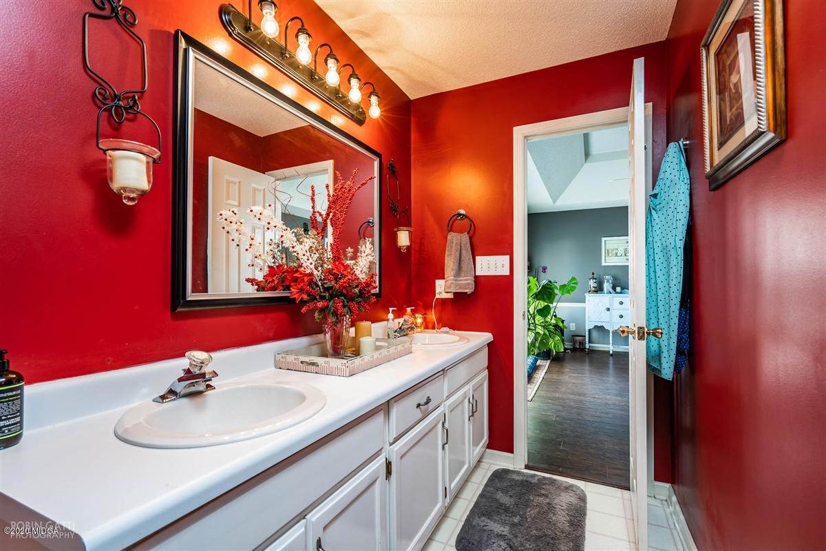 6180 Skipperton Road Macon, GA 31216 - Photo 17 of 37 a bathroom with a sink and a mirror