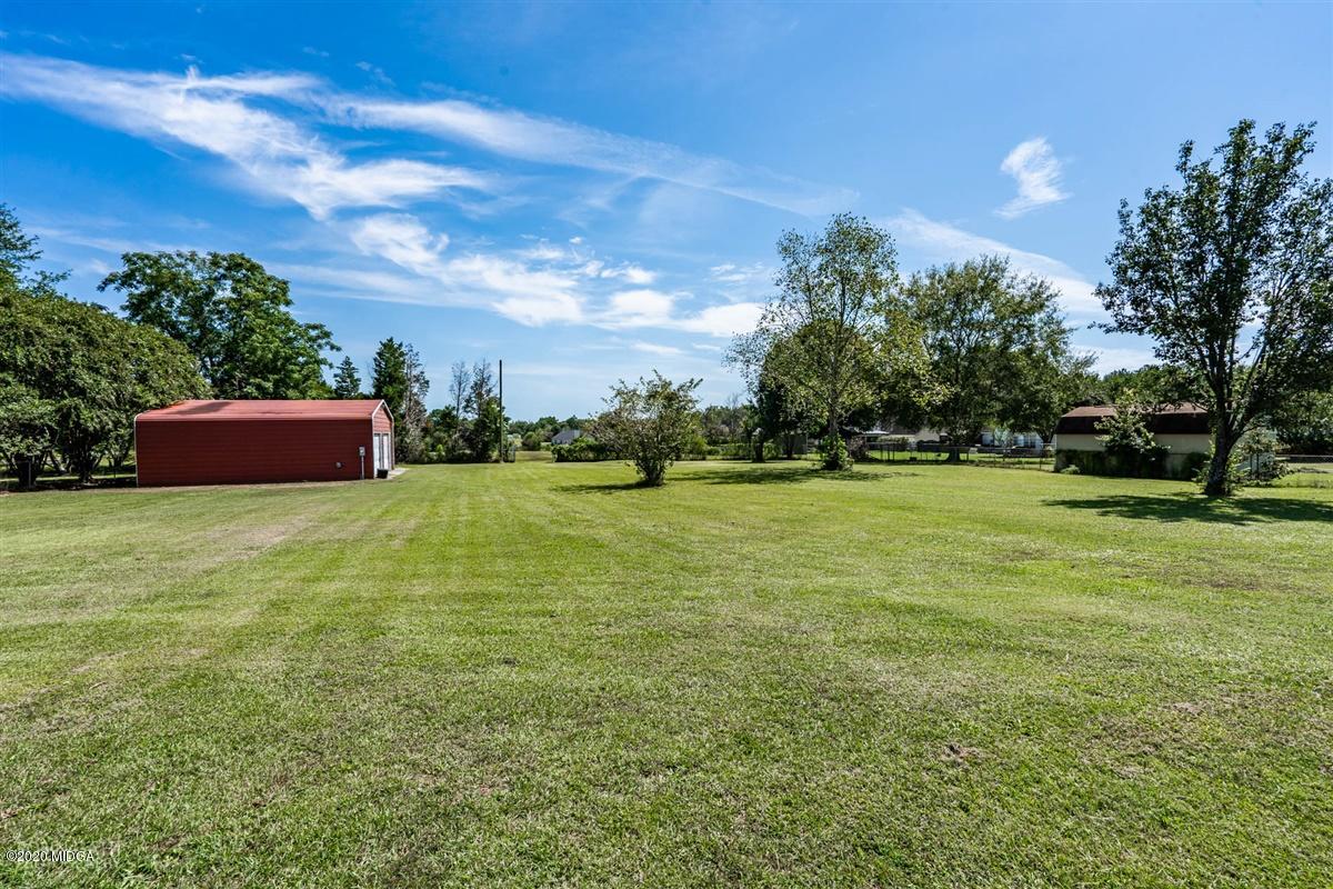 6180 Skipperton Road Macon, GA 31216 - Photo 34 of 37 a big yard with lots of green space