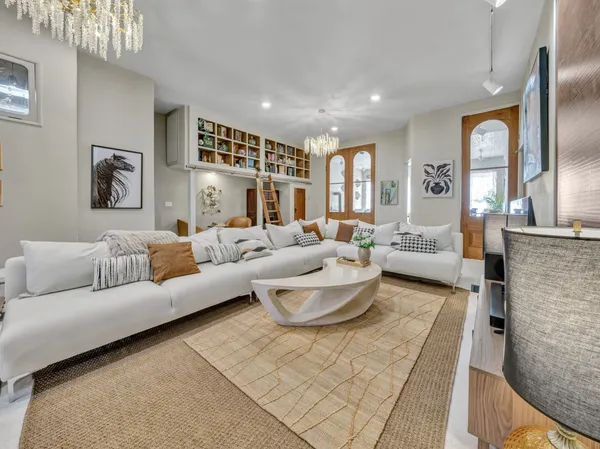 a kitchen with a sink and a wooden cabinets