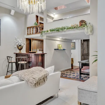 a kitchen with stove and cabinets