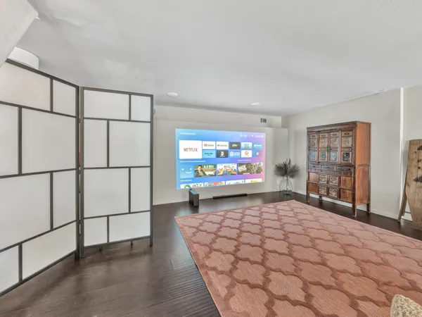 a living room with furniture and a couch