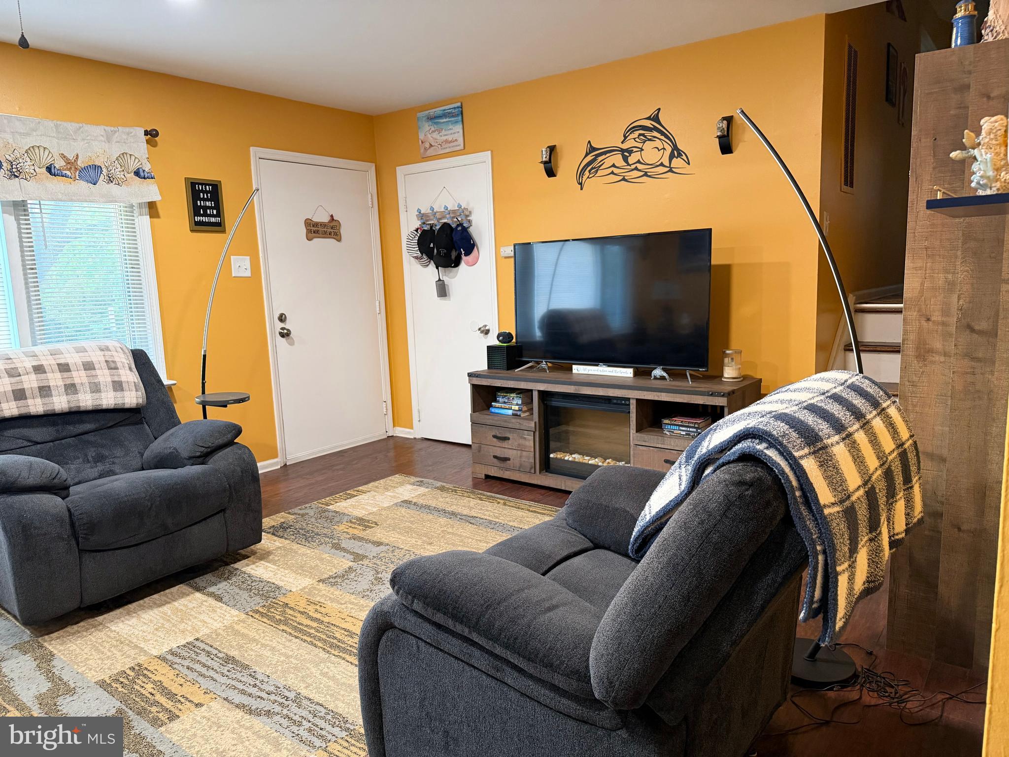 1 Nassau Road Somers Point, NJ 08244 - Photo 3 of 43 a living room with furniture and a flat screen tv