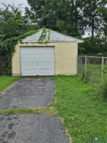 a view of backyard with green space