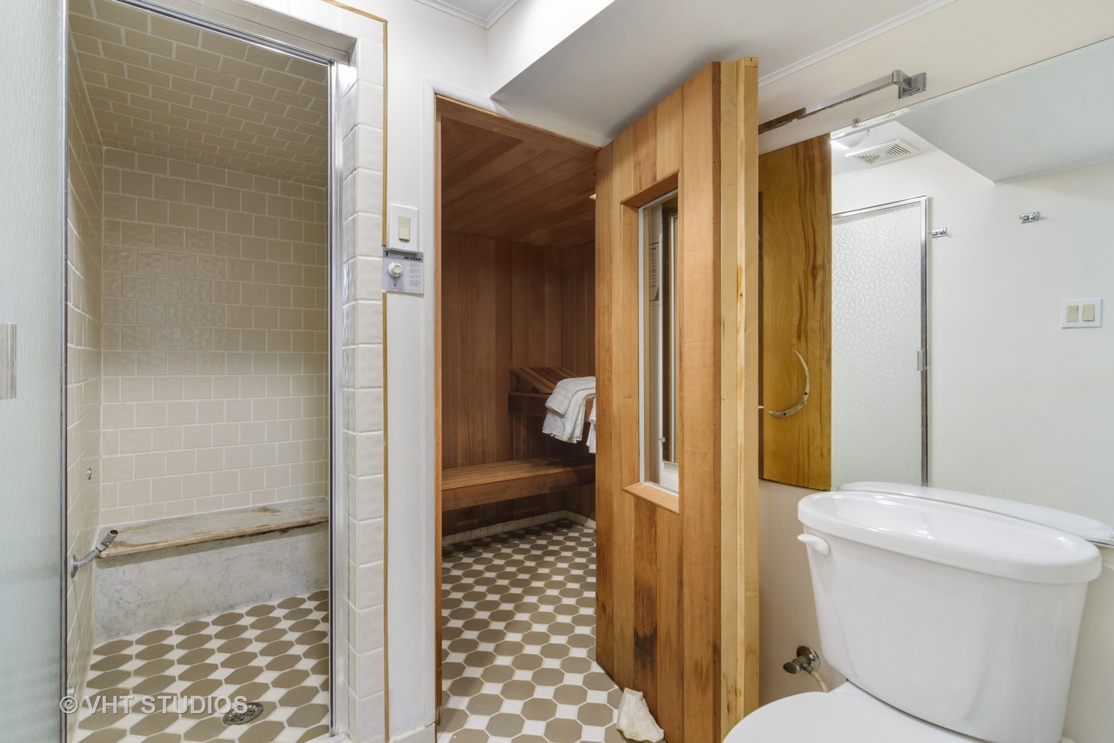 838 Juniper Road Glenview, IL 60025 - Photo 22 of 30 a bathroom with a toilet and a shower