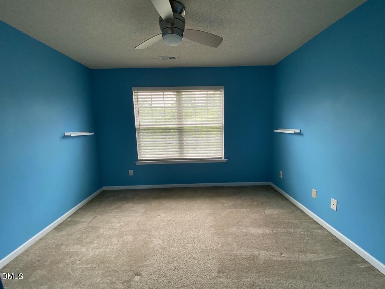 5457 Patuxent Drive Raleigh, NC 27616 - Photo 16 of 20 an empty room with a window