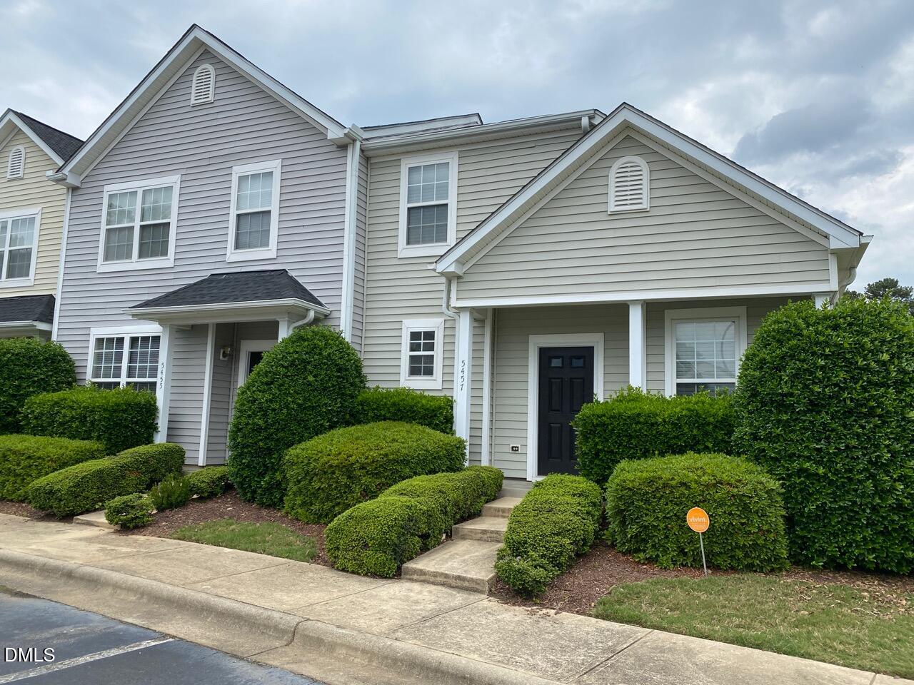 5457 Patuxent Drive Raleigh, NC 27616 - Photo 2 of 20 a front view of a house with a yard